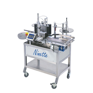 Étiqueteuse automatique Ninette 1 poste sur convoyeur chassis inox